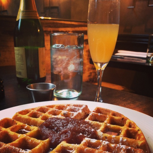 Pumpkin spice waffle with apple butter and peach bellini.